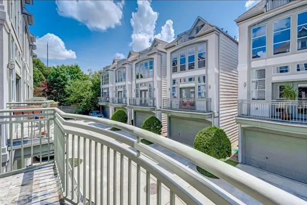 a view of balcony with furniture