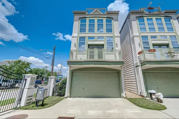 a front view of a house with balcony