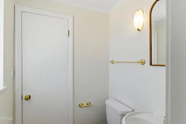 a view of an empty room with a fan