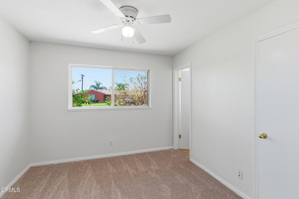 1290 Lawrence Circle Simi Valley, CA 93065 - Photo 16 of 37 an empty room with a window and a ceiling fan