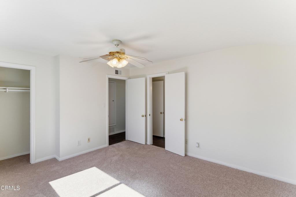 1290 Lawrence Circle Simi Valley, CA 93065 - Photo 20 of 37 a very nice looking room with a chandelier fan and a window