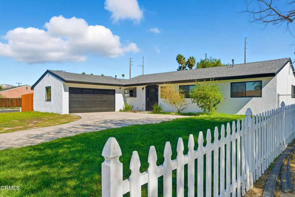 1290 Lawrence Circle Simi Valley, CA 93065 - Photo 2 of 37 a front view of a house with garden
