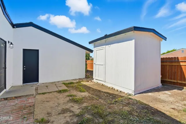 a house with trees in front of it