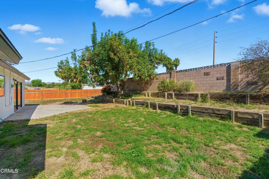 1290 Lawrence Circle Simi Valley, CA 93065 - Photo 27 of 37 a view of a backyard with sitting area