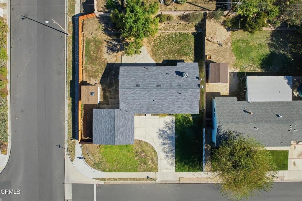 1290 Lawrence Circle Simi Valley, CA 93065 - Photo 32 of 37 an aerial view of a house with a yard and large tree