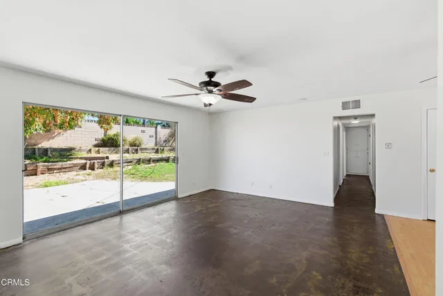 a bathroom with a granite countertop sink