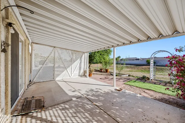 a backyard of a house with entertaining space