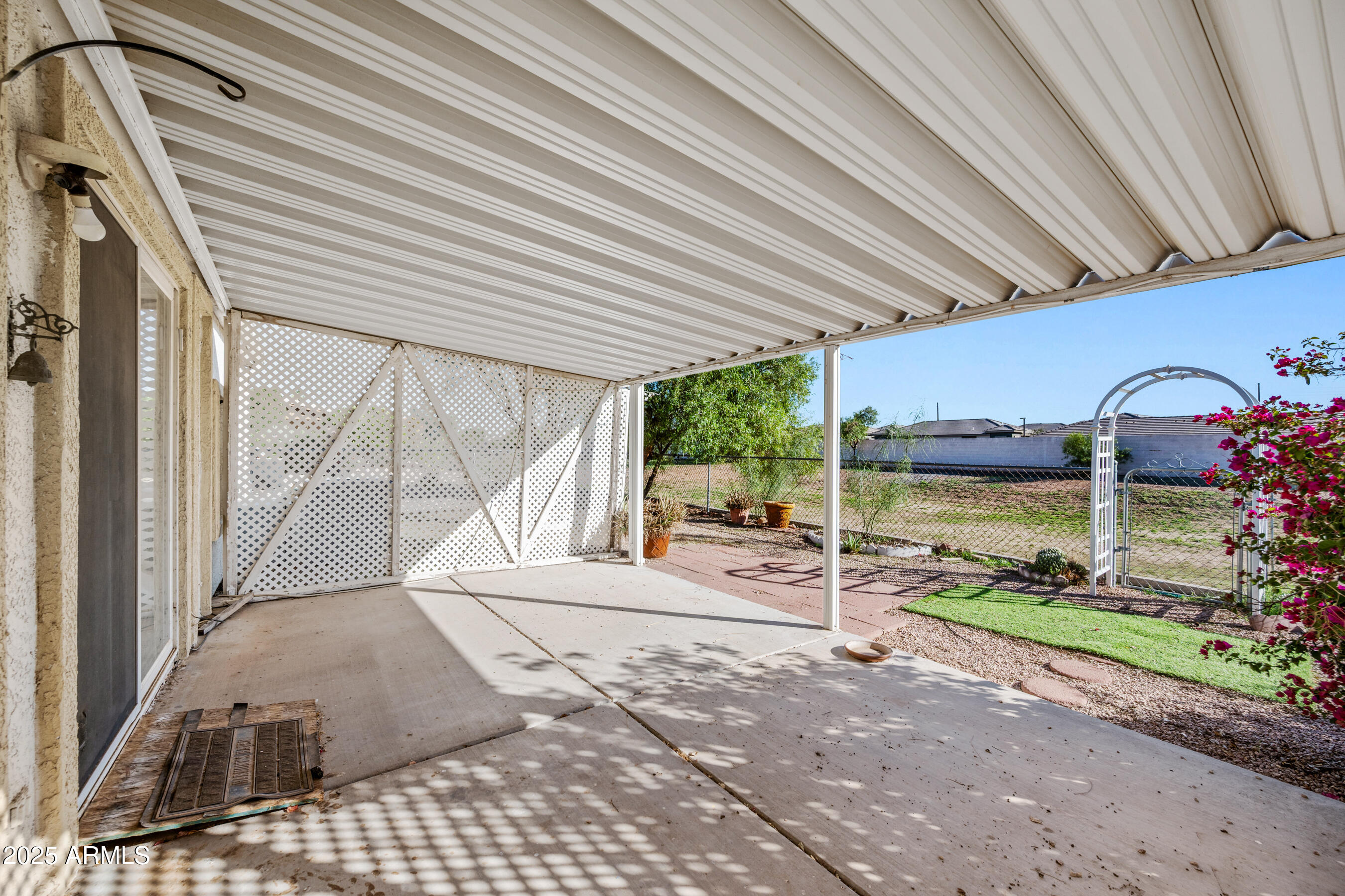 2101 South Meridian Road, Unit 49 Apache Junction, AZ 85120 - Photo 13 of 42 a view of outdoor space and yard