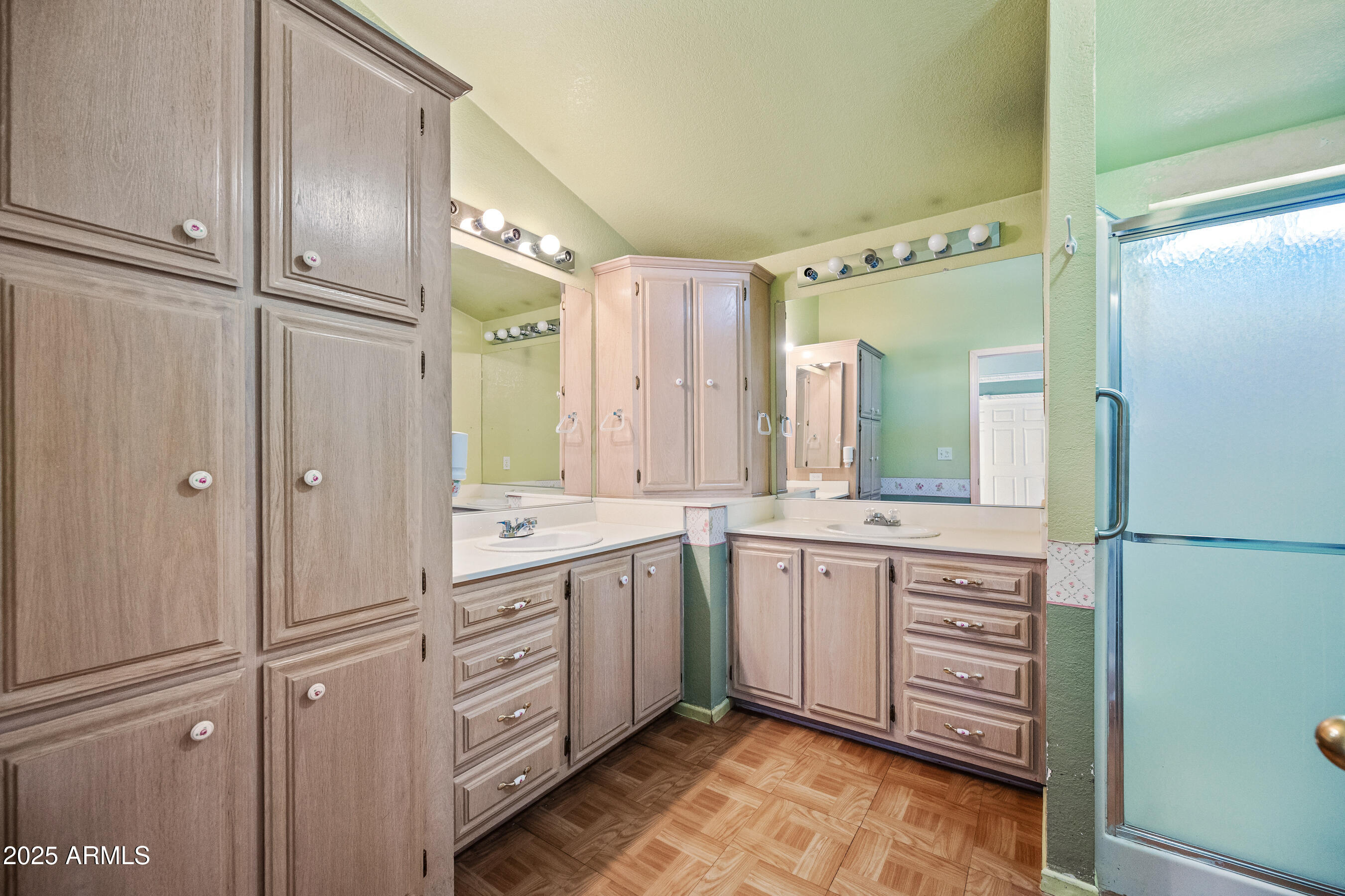 2101 South Meridian Road, Unit 49 Apache Junction, AZ 85120 - Photo 18 of 42 a spacious bathroom with a double vanity sink a mirror and a bathtub