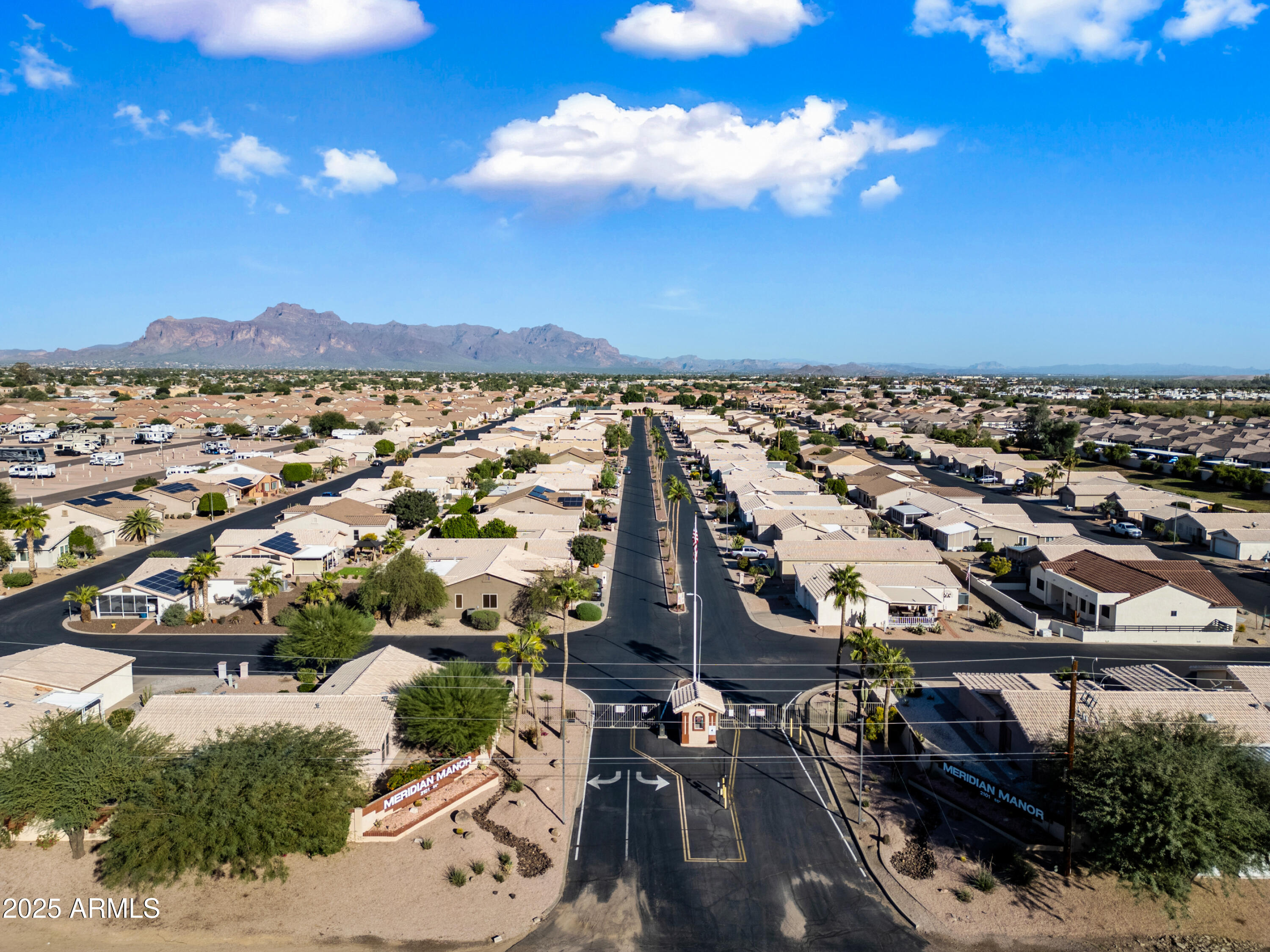 2101 South Meridian Road, Unit 49 Apache Junction, AZ 85120 - Photo 37 of 42 an aerial view of multiple house