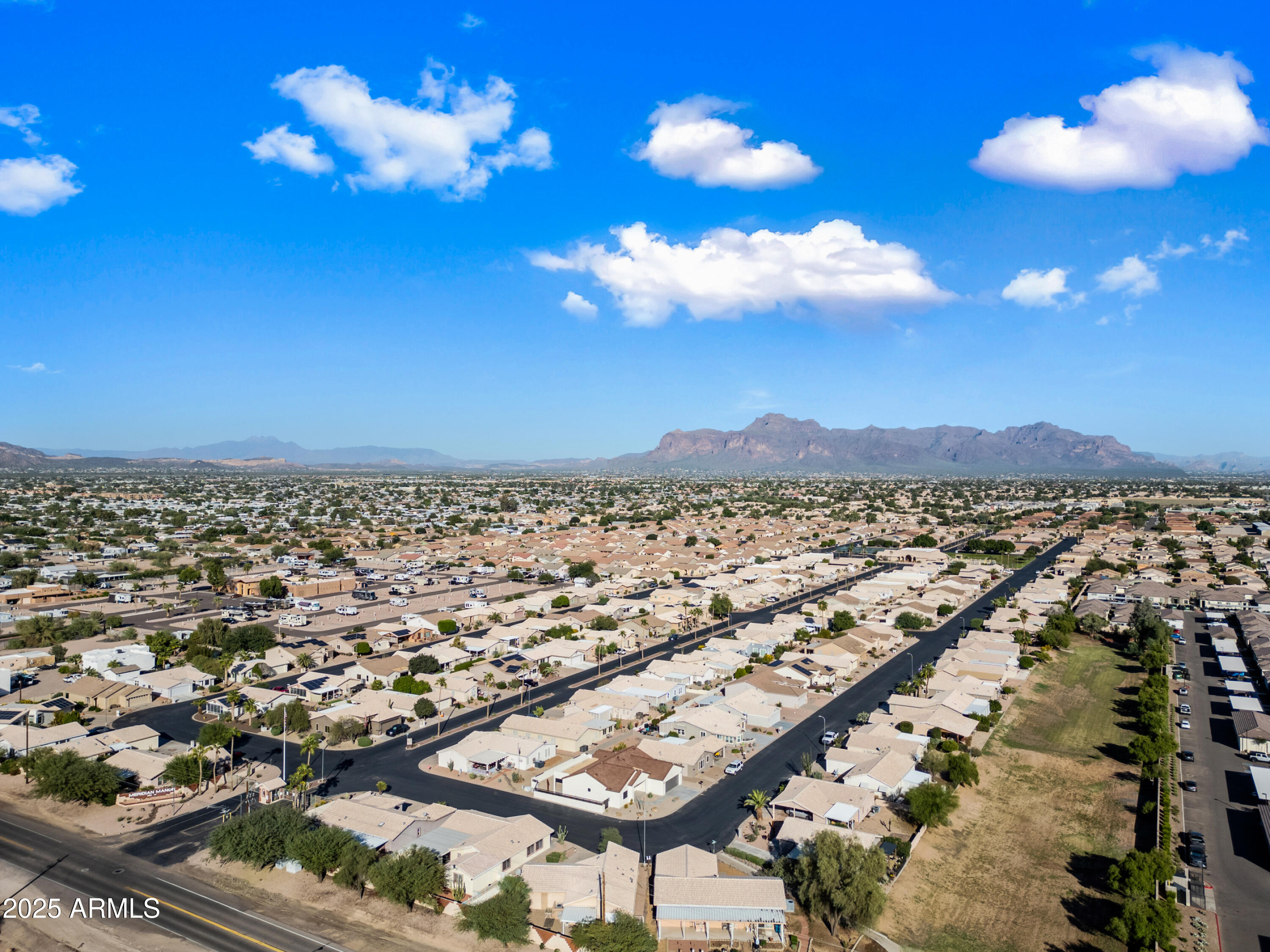 2101 South Meridian Road, Unit 49 Apache Junction, AZ 85120 - Photo 38 of 44 an aerial view of a city