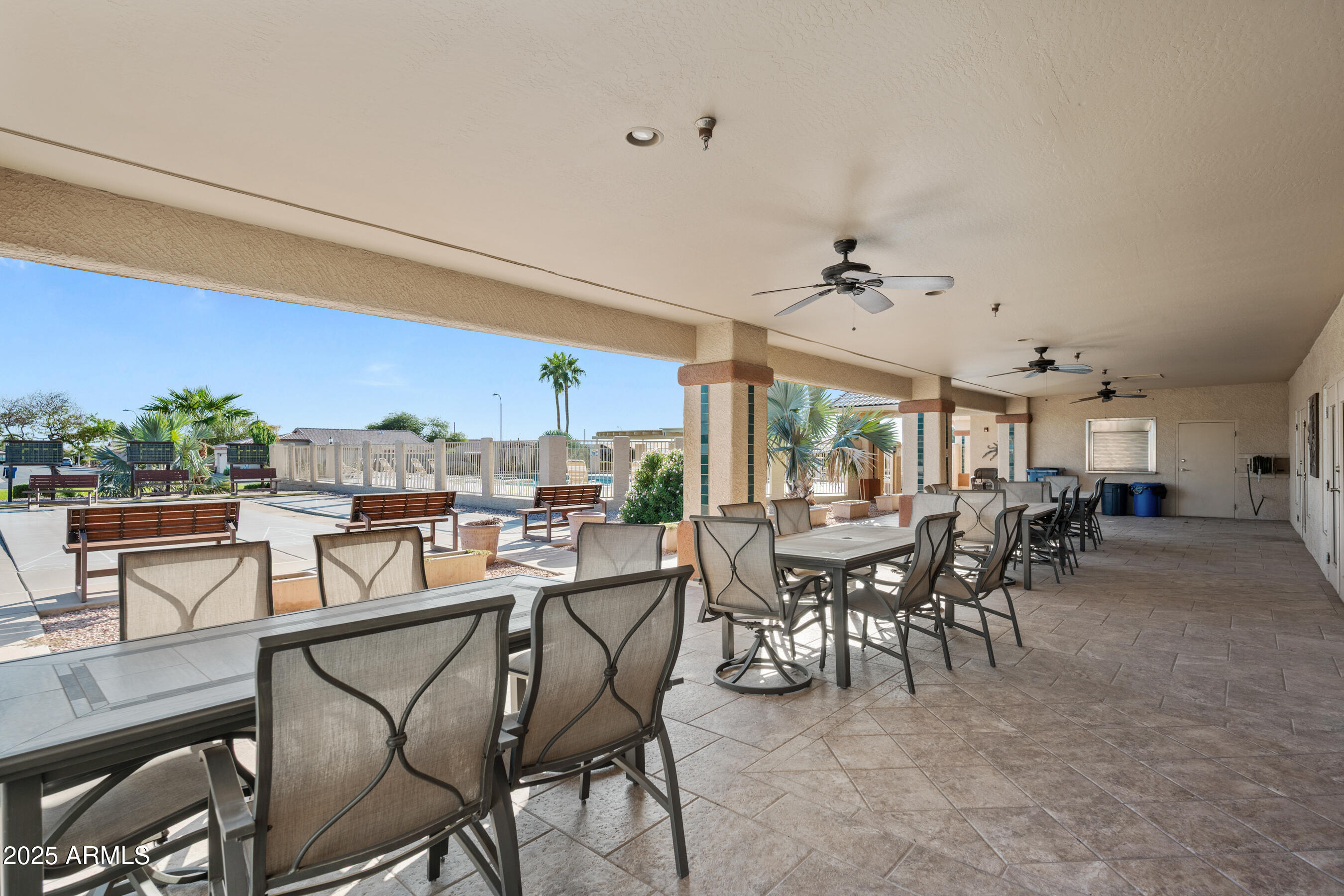 2101 South Meridian Road, Unit 49 Apache Junction, AZ 85120 - Photo 43 of 44 a view of a dining room with furniture window and outside view