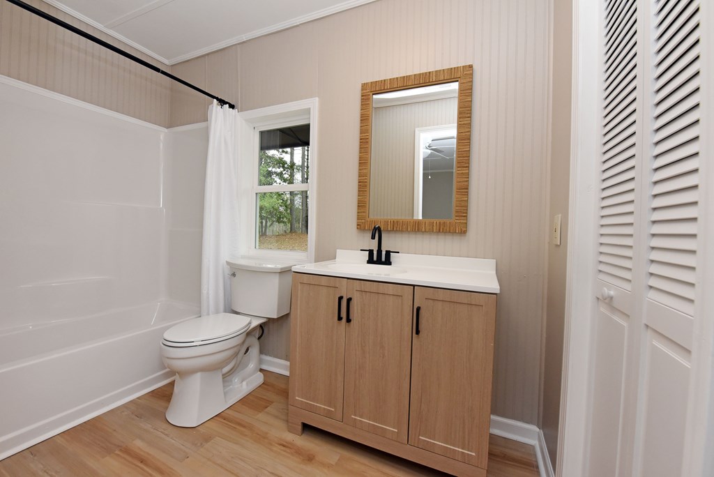 21 River Rd Drive Blairsville, GA 30512 - Photo 23 of 39 a bathroom with a sink toilet and shower