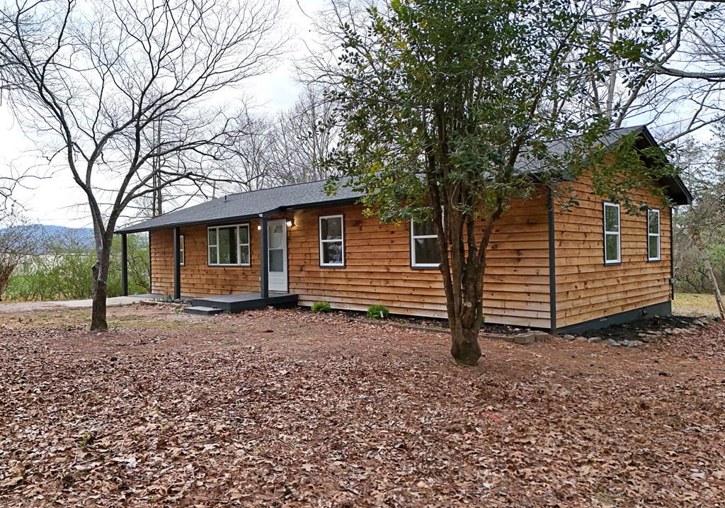 21 River Rd Drive Blairsville, GA 30512 - Photo 34 of 39 a view of a house with a yard