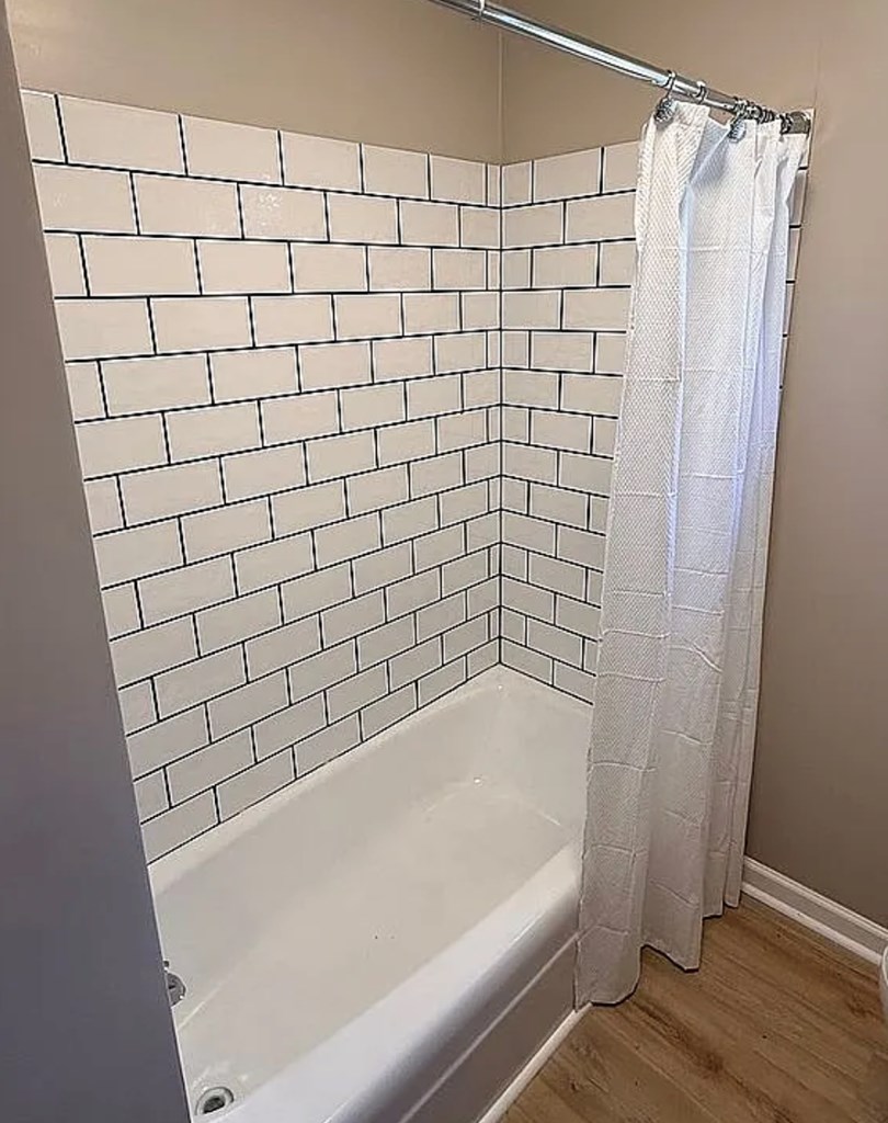 21 River Rd Drive Blairsville, GA 30512 - Photo 4 of 39 a bathroom with a bathtub and shower