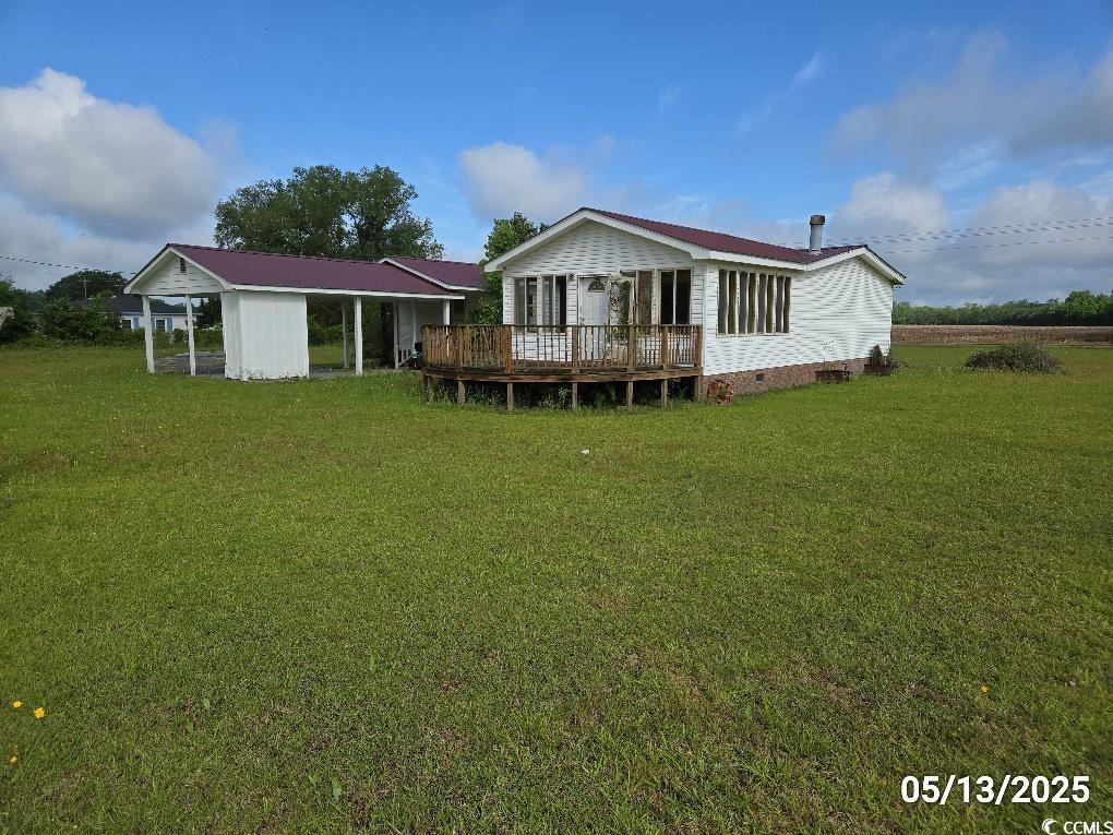 11 Lilac Lane Nesmith, SC 29580 - Photo 11 of 34 Rear view of property featuring a deck, a yard, an