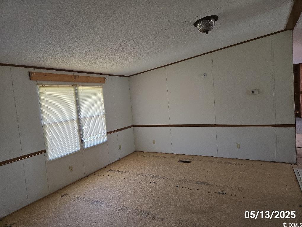 11 Lilac Lane Nesmith, SC 29580 - Photo 17 of 34 Unfurnished room featuring a textured ceiling and