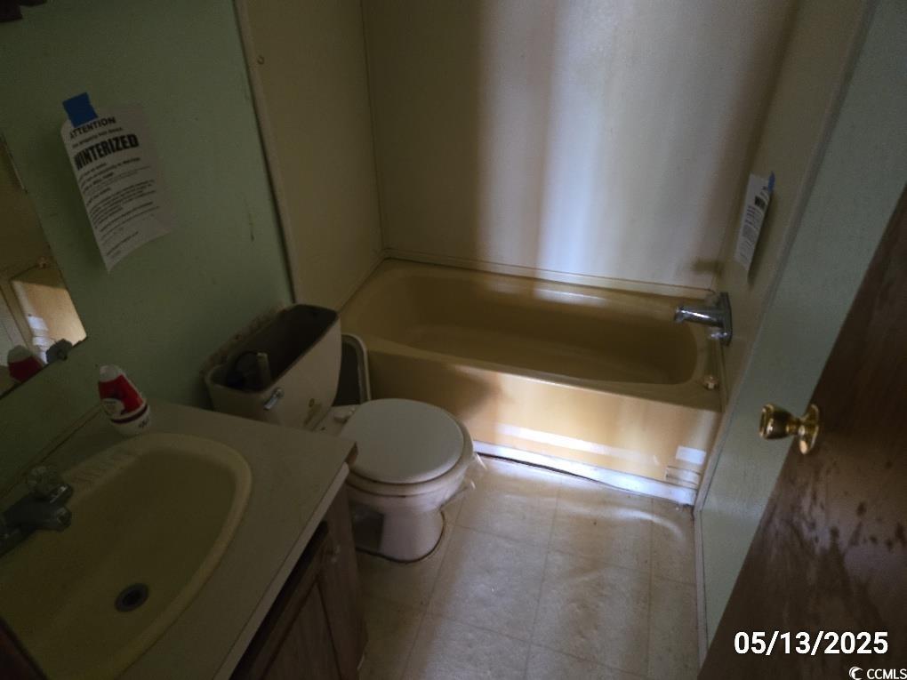 11 Lilac Lane Nesmith, SC 29580 - Photo 29 of 34 Bathroom with a tub to relax in, toilet, and vanit
