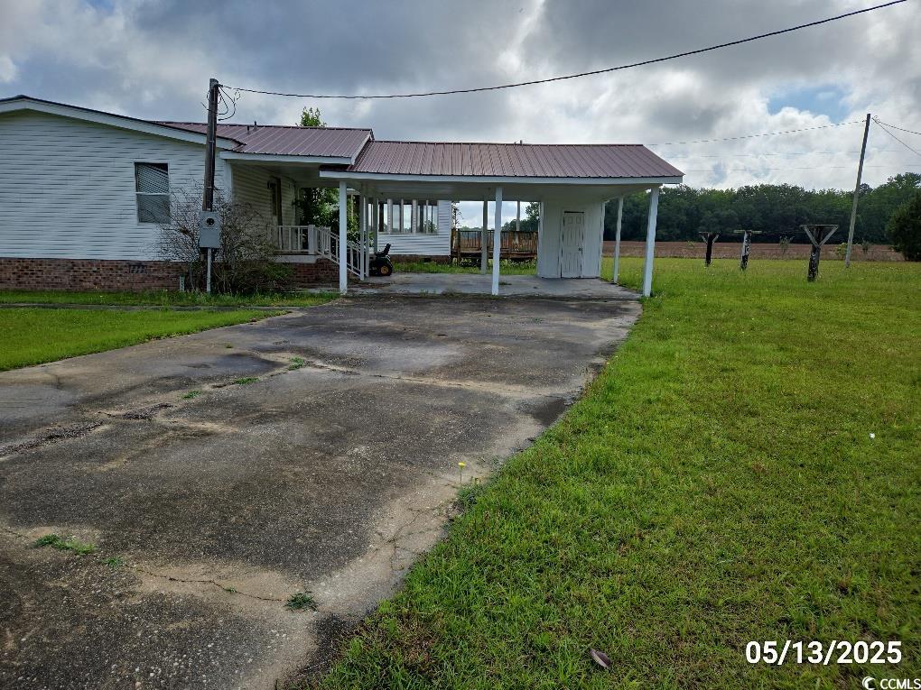 11 Lilac Lane Nesmith, SC 29580 - Photo 4 of 34 View of front of house with a front yard, driveway