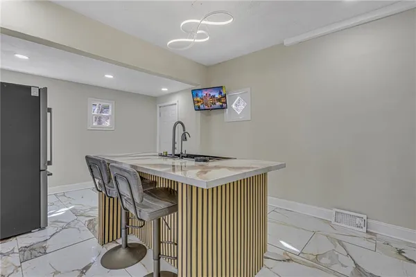 a view of a livingroom and furniture