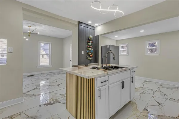 a kitchen with a stove and cabinets