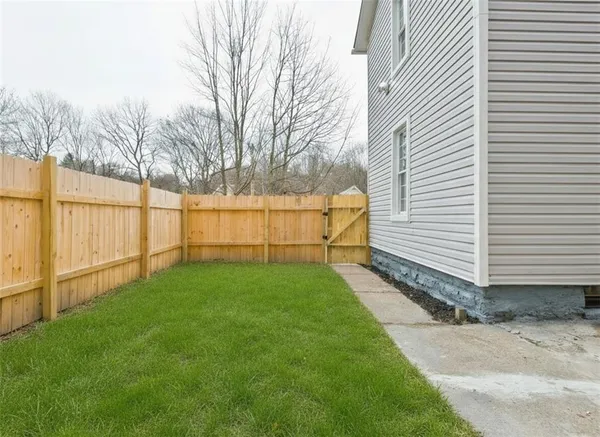 a view of backyard with cabin