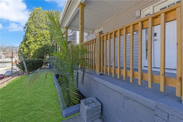 a view of balcony with a plant and plants