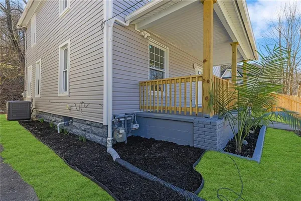 a view of a back yard of the house