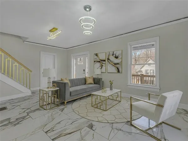 a living room with furniture and a window