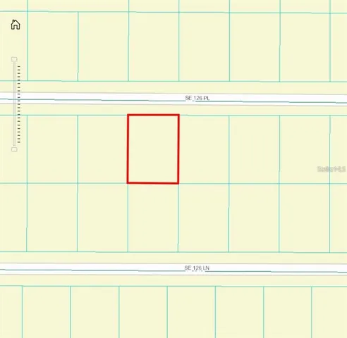 a view of a golf course with a lake