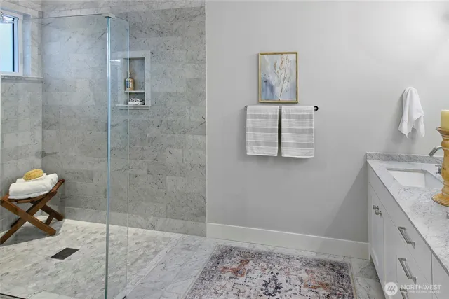 a bathroom with a sink toilet and vanity