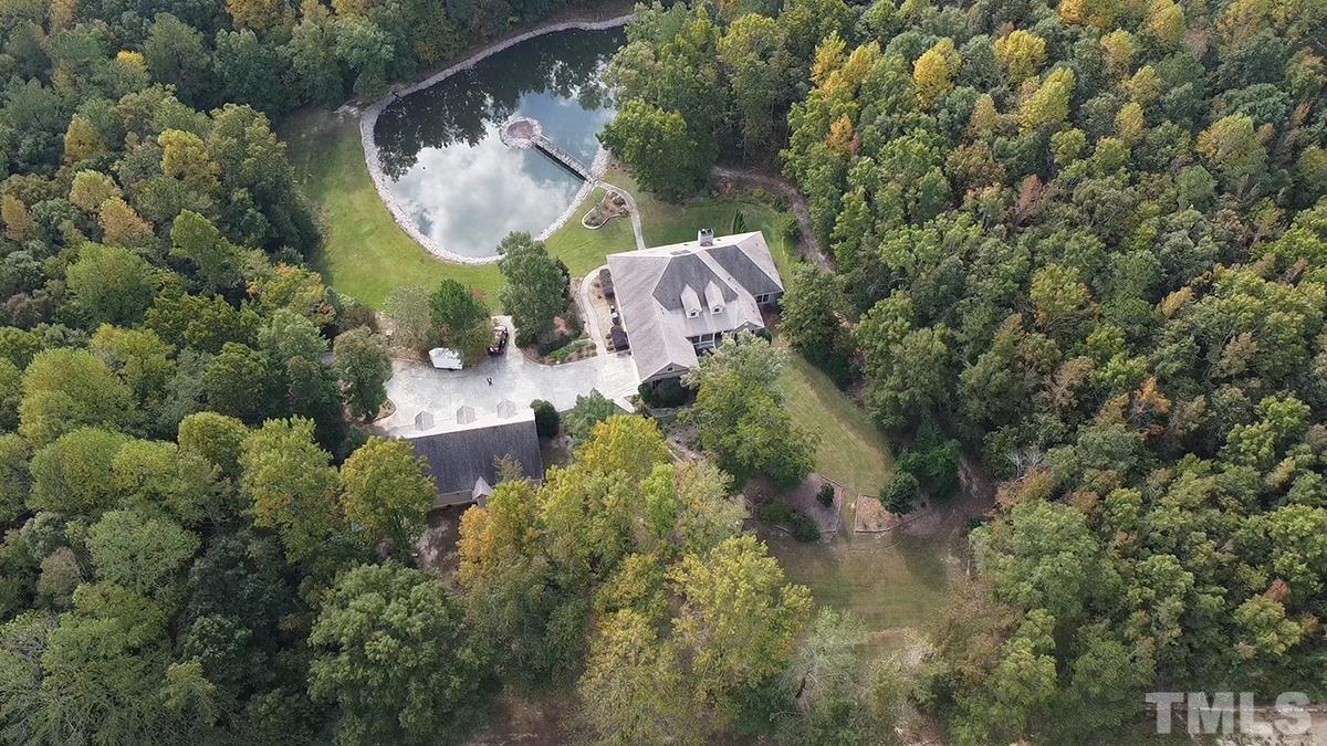 7400 Lancaster Store Road Spring Hope, NC 27882 - Photo 3 of 86 an aerial view of a house with swimming pool and garden view