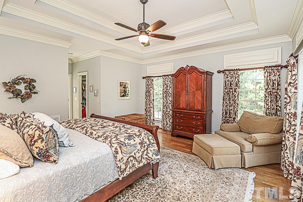 7400 Lancaster Store Road Spring Hope, NC 27882 - Photo 41 of 86 a bedroom with a bed couch and window