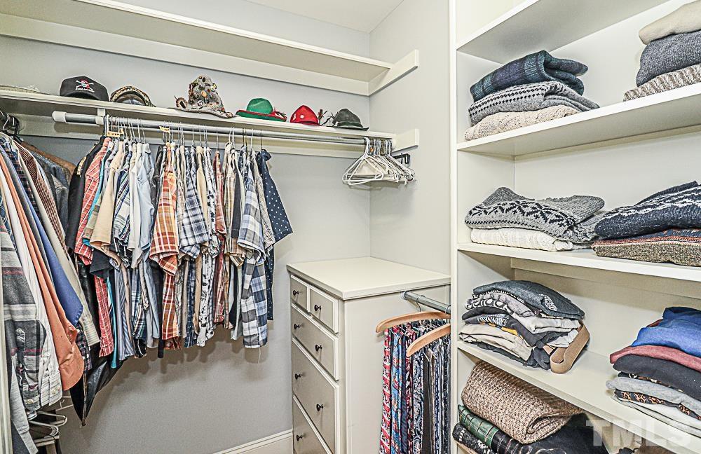 7400 Lancaster Store Road Spring Hope, NC 27882 - Photo 49 of 86 a view of walk in closet with clothes and shoes