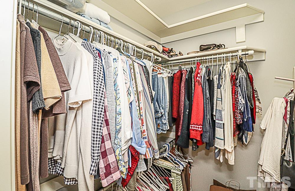 7400 Lancaster Store Road Spring Hope, NC 27882 - Photo 50 of 86 a view of walk in closet with clothes