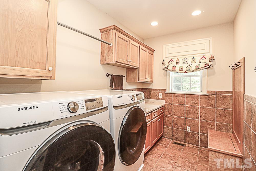 7400 Lancaster Store Road Spring Hope, NC 27882 - Photo 53 of 86 a utility room with dryer and washer