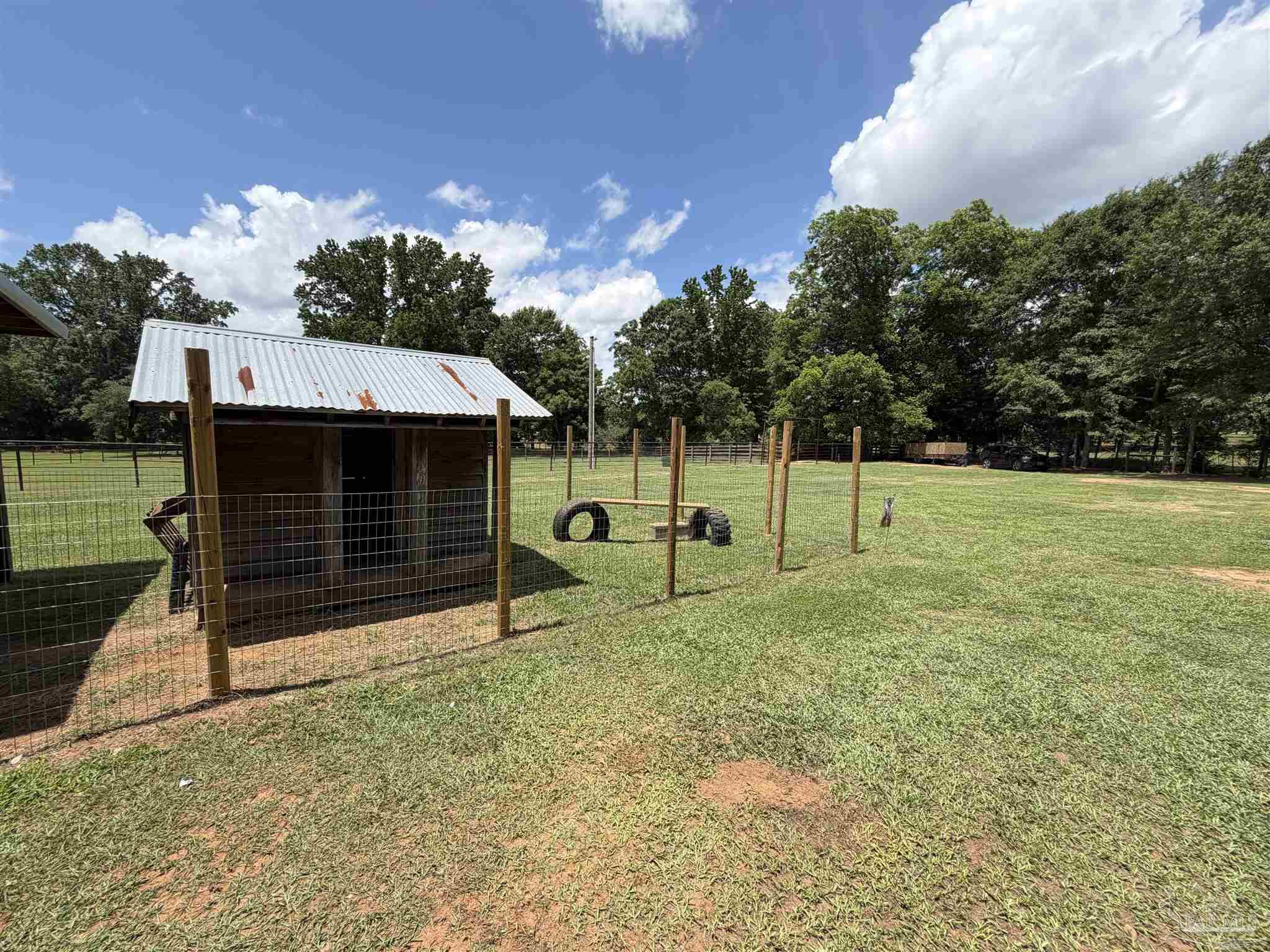 145 Tower Road Uriah, AL 36480 - Photo 41 of 72 a view of a house with a backyard