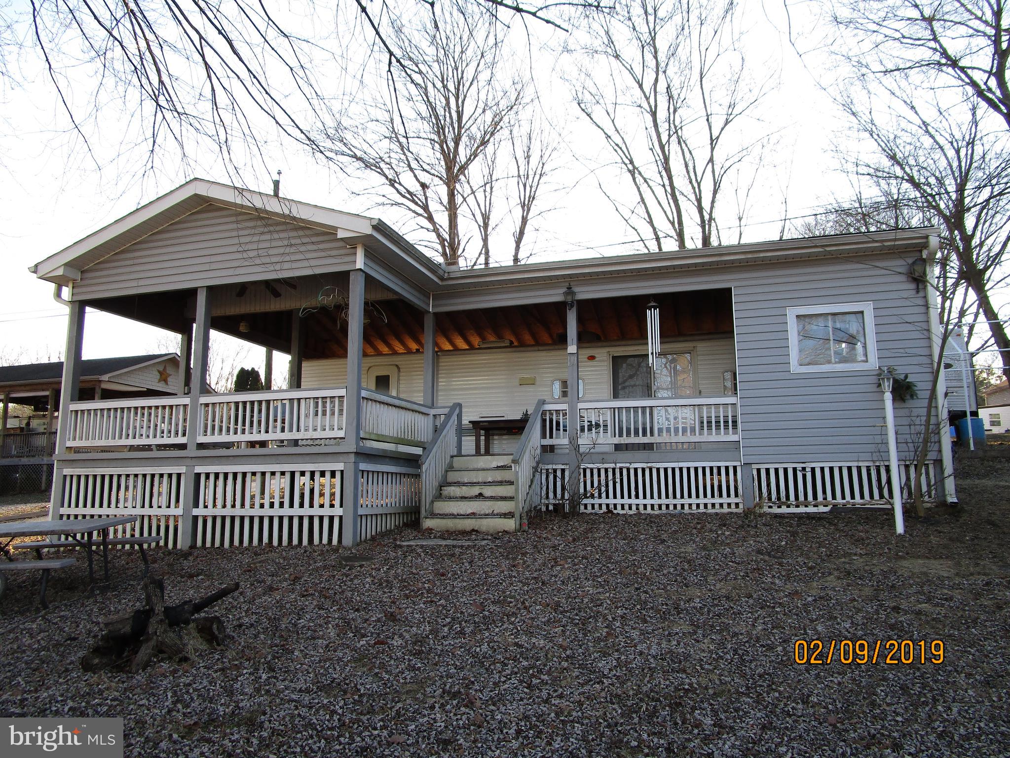 220 Boo Boo Boulevard Falling Waters, WV 25419 - Photo 1 of 14 Front