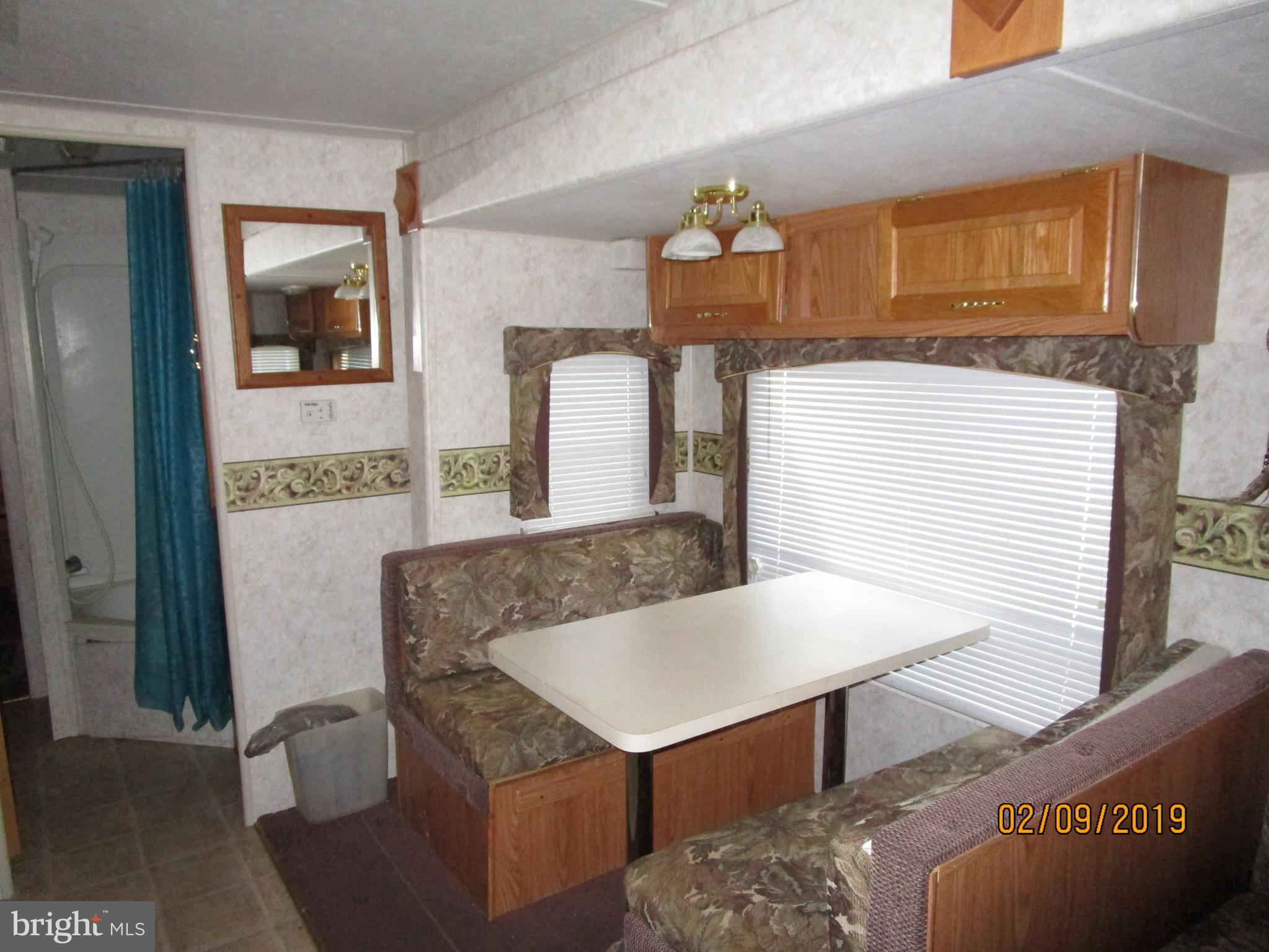 220 Boo Boo Boulevard Falling Waters, WV 25419 - Photo 12 of 14 Travel trailer eating area