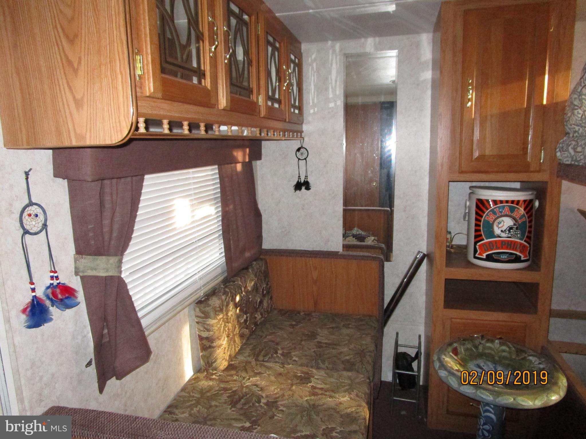 220 Boo Boo Boulevard Falling Waters, WV 25419 - Photo 13 of 14 travel trailer sleeping area