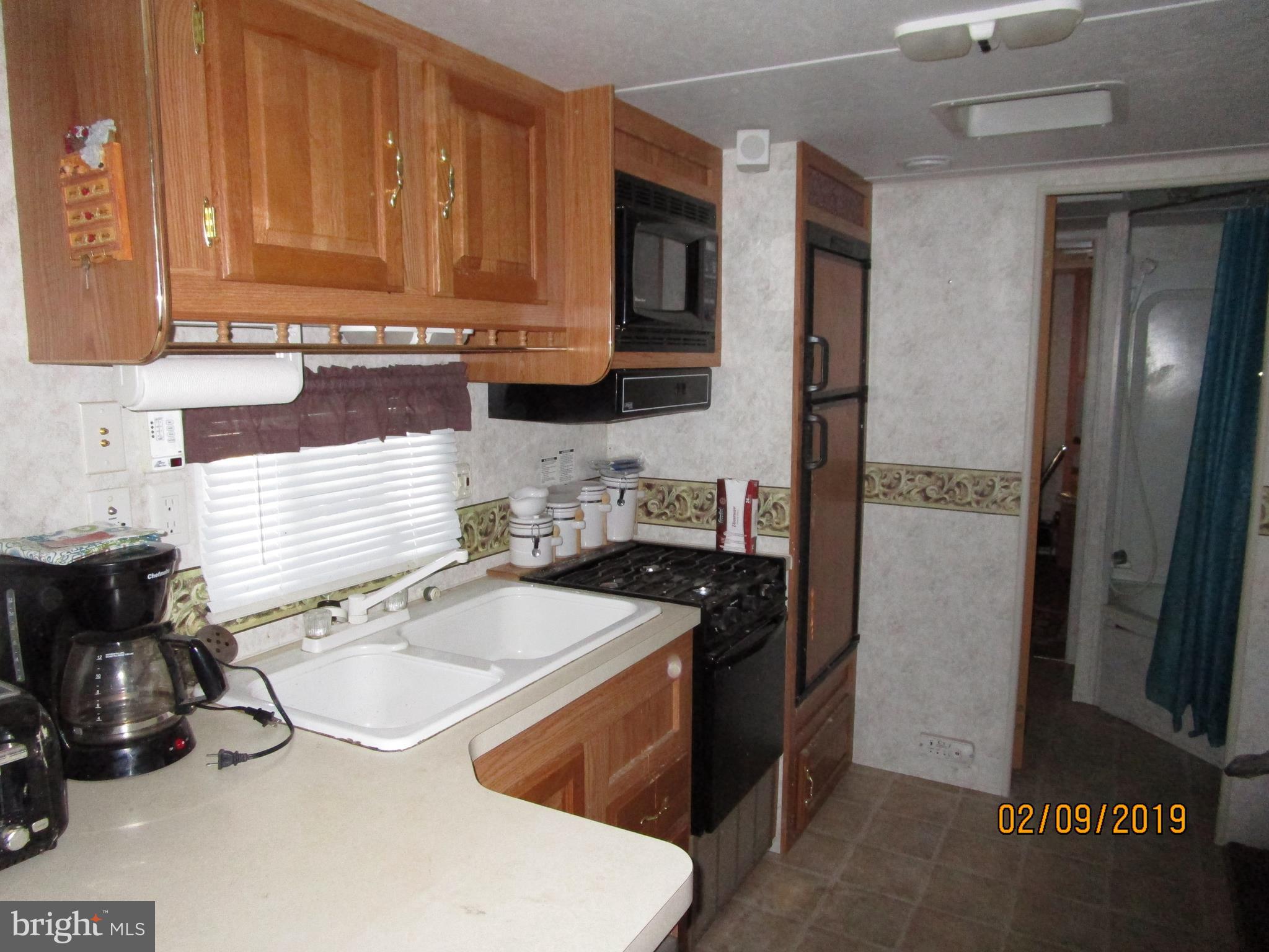 220 Boo Boo Boulevard Falling Waters, WV 25419 - Photo 10 of 14 Travel trailer kitchen