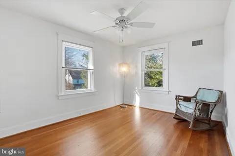 a view of a livingroom with furniture and a window