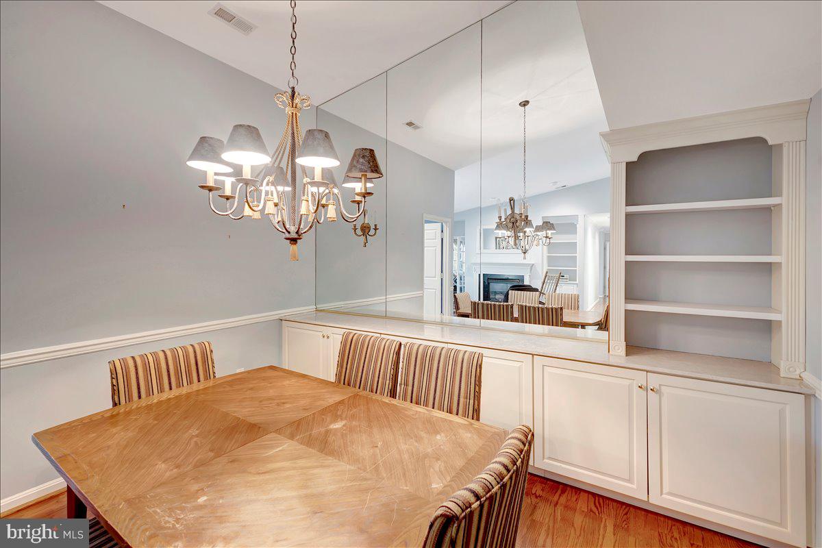 12310 Rosslare Ridge Road, Unit 501 Lutherville-Timonium, MD 21093 - Photo 14 of 43 Beautiful lighting, built-ins and mirrored wall