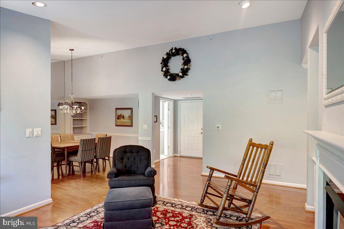 12310 Rosslare Ridge Road, Unit 501 Lutherville-Timonium, MD 21093 - Photo 15 of 43 Living room flows from formal dining room