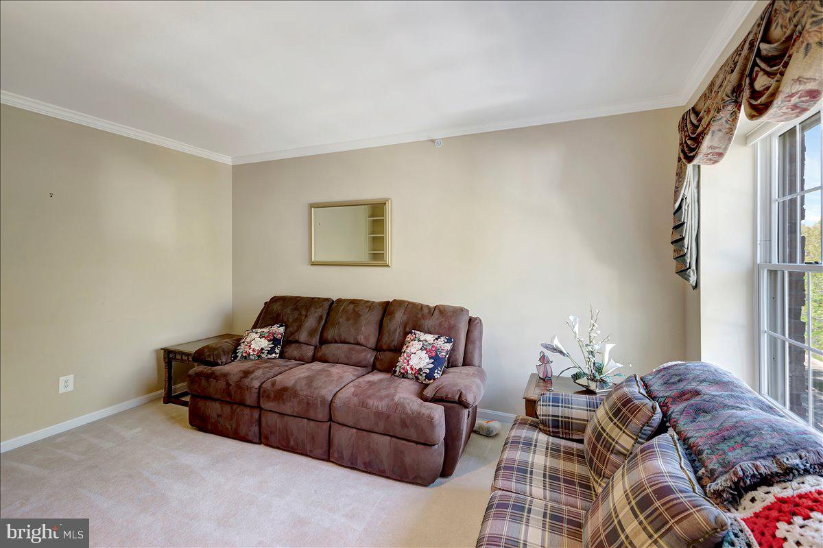 12310 Rosslare Ridge Road, Unit 501 Lutherville-Timonium, MD 21093 - Photo 21 of 43 Den has neutral plush carpeting