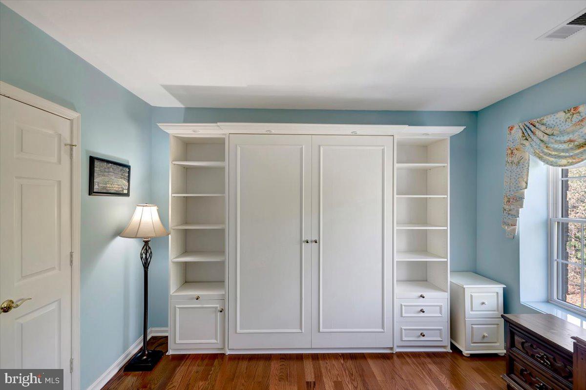 12310 Rosslare Ridge Road, Unit 501 Lutherville-Timonium, MD 21093 - Photo 31 of 43 Pull down Murphy bed for overnight guests