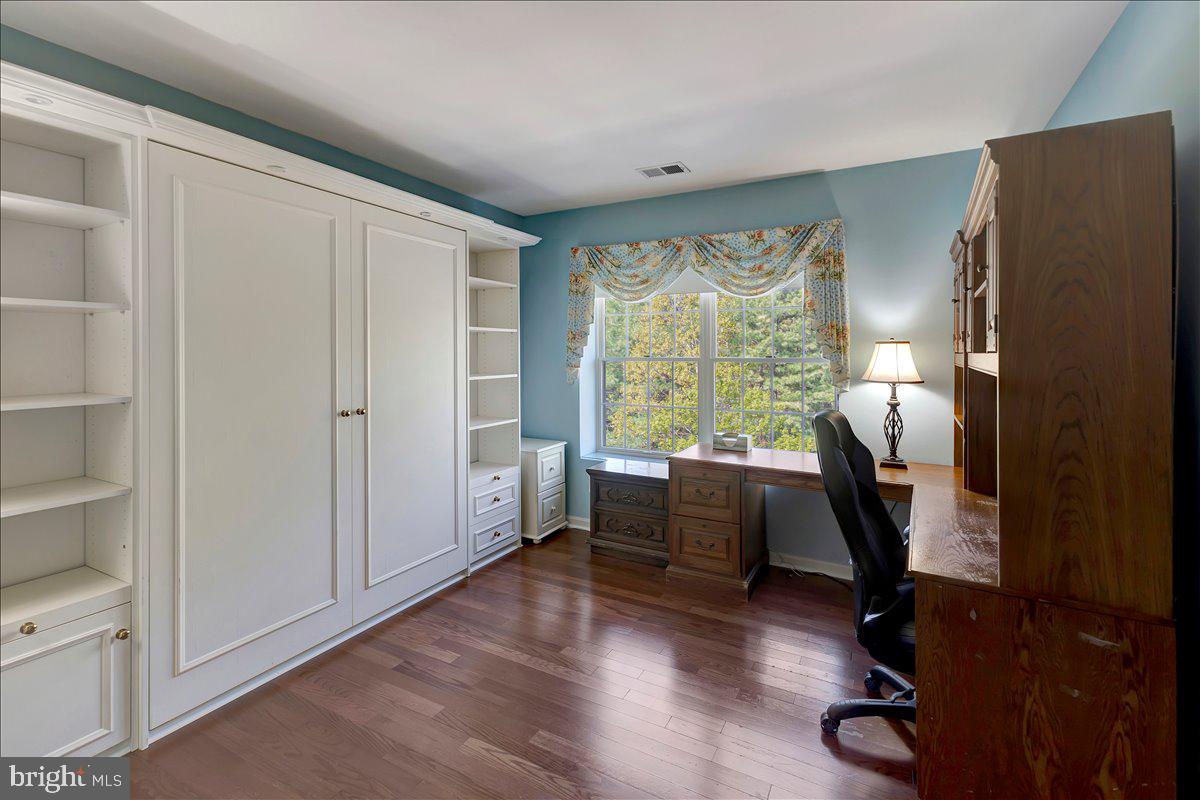 12310 Rosslare Ridge Road, Unit 501 Lutherville-Timonium, MD 21093 - Photo 32 of 43 Even bedrooms all feature beautiful wood flooring