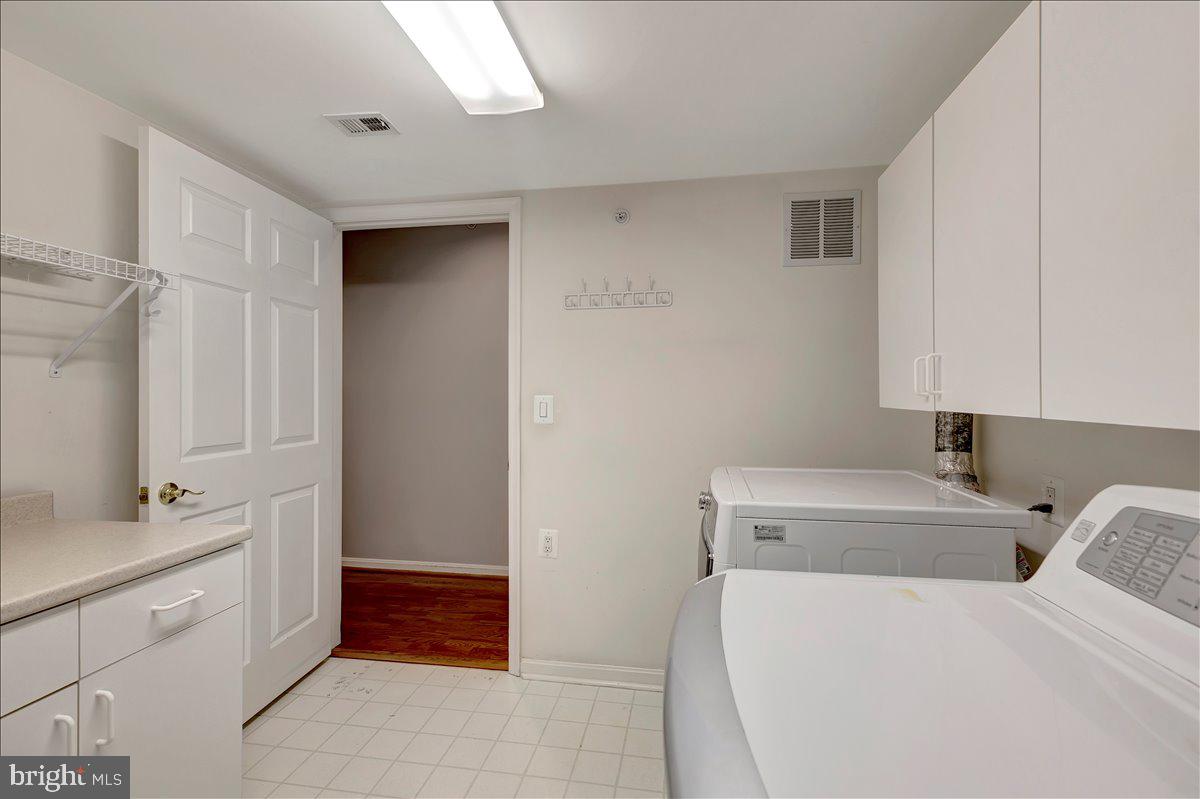 12310 Rosslare Ridge Road, Unit 501 Lutherville-Timonium, MD 21093 - Photo 38 of 46 Again, lots of built-ins in laundry room