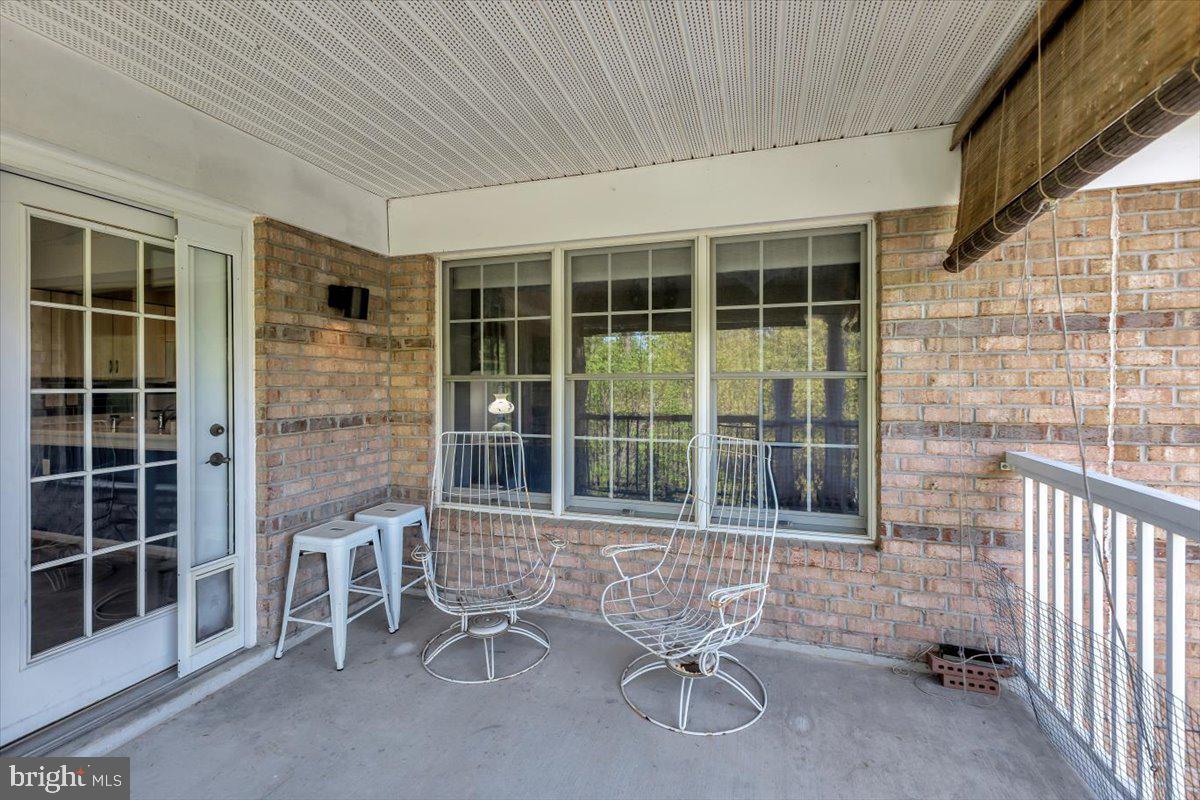 12310 Rosslare Ridge Road, Unit 501 Lutherville-Timonium, MD 21093 - Photo 40 of 43 Triple windows looking into Living Room