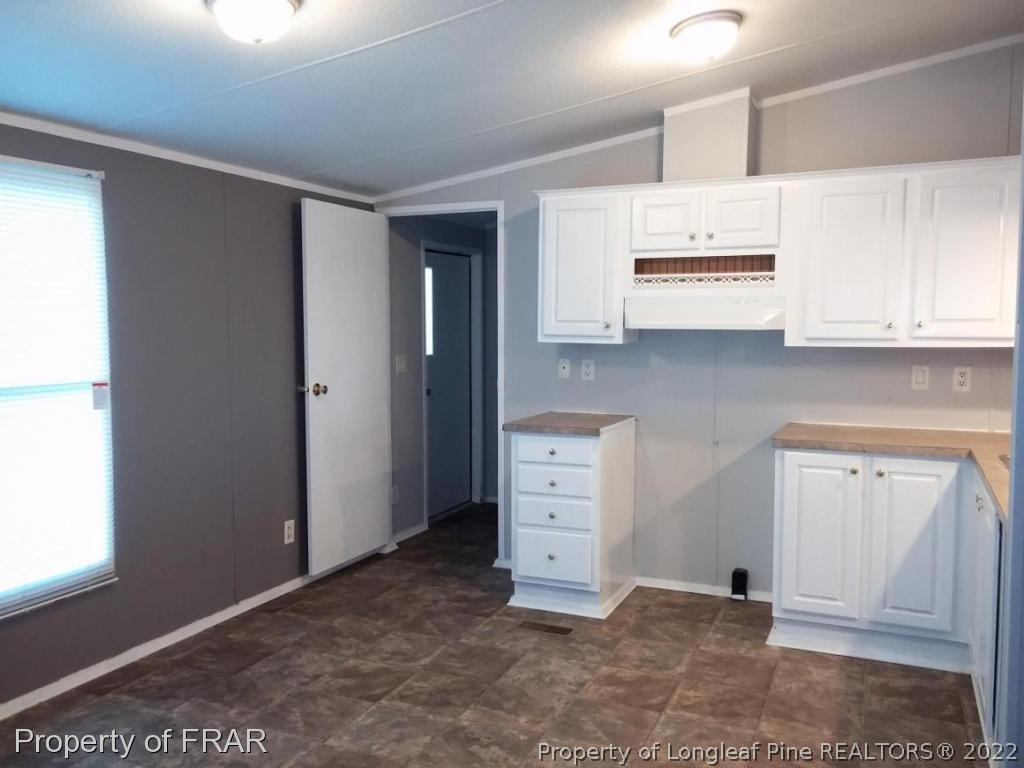 358 Capel Mill Road Candor, NC 27229 - Photo 2 of 11 a view of cabinets
